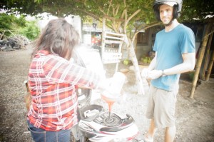 Refilling gas from a bottle. @7000 IDR